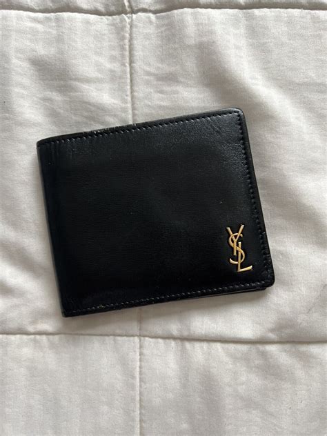 ysl east west wallet|YSL wallet used.